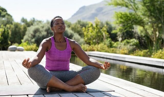 mature-woman-meditation-yoga
