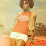 70s Fashion Model for Funk Therapy Merchandise Store - Orange T-Shirt - Beige Logo