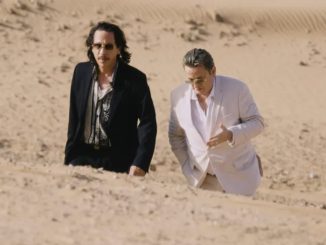 2 men walking in the desert