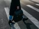 person-carrying-bag-walking-on-pedestrian-lane-842963/