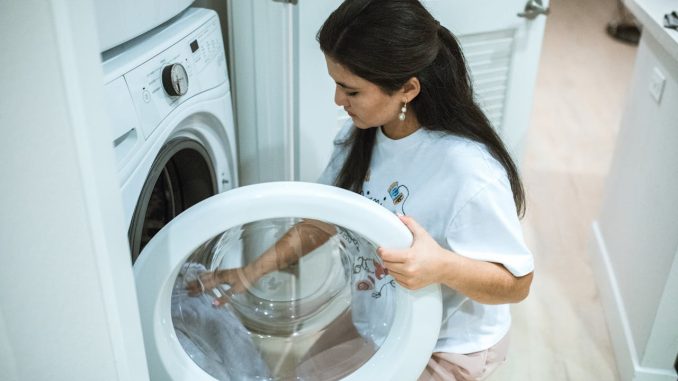woman opening her dryer