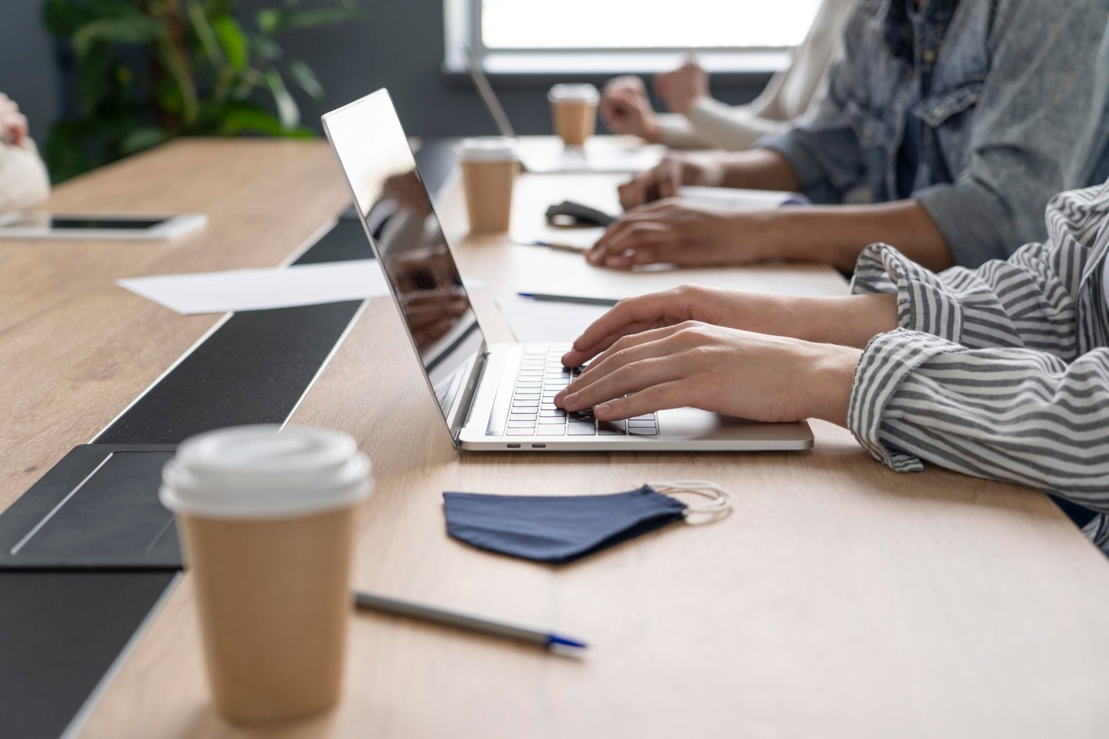 people-working-while-respecting-social-distancing-restriction