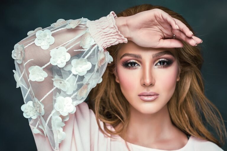 woman-wearing-floral-long-sleeved-shirt-covering-her-forehead-2823974