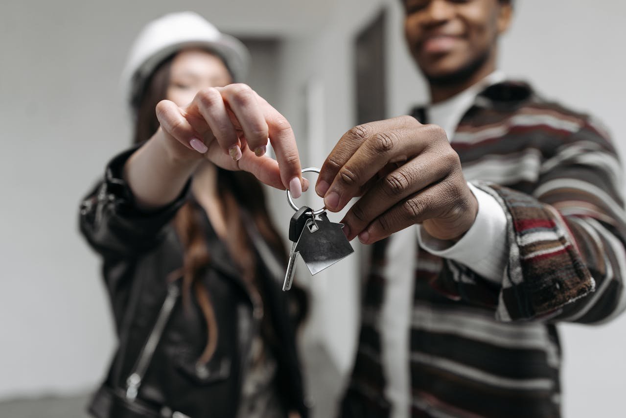 httpswww.pexels.comphotoa-couple-holding-their-house-key-