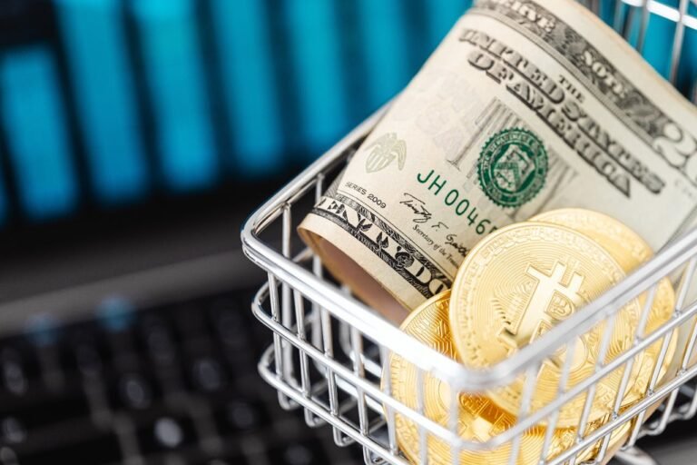 Kaboompics.com httpswww.pexels.comphotogold-bitcoin-coins-and-cash-in-a-miniature-shopping-cart-5980886