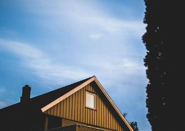 a house with a chimney and a window