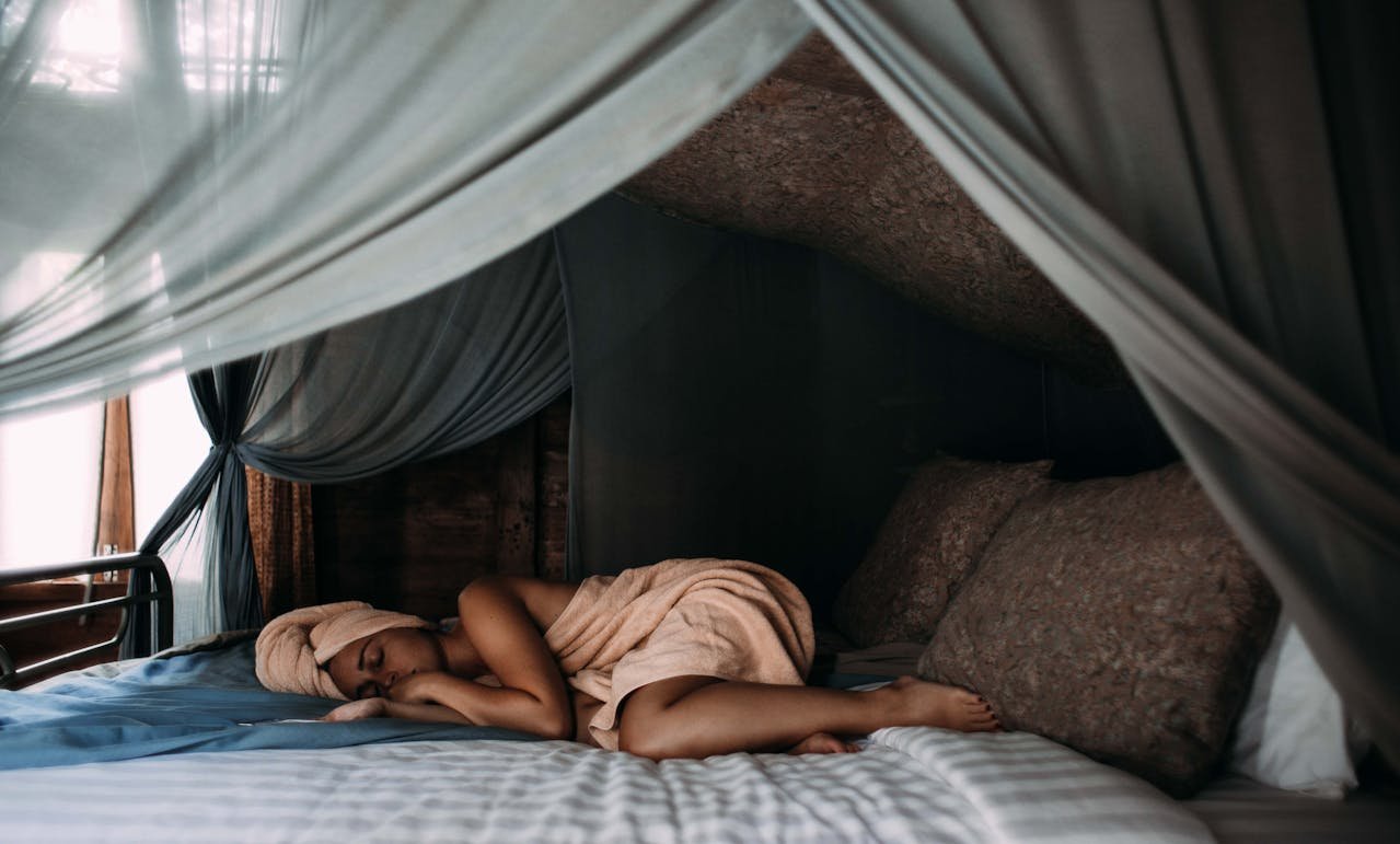 sleep woman on a bed