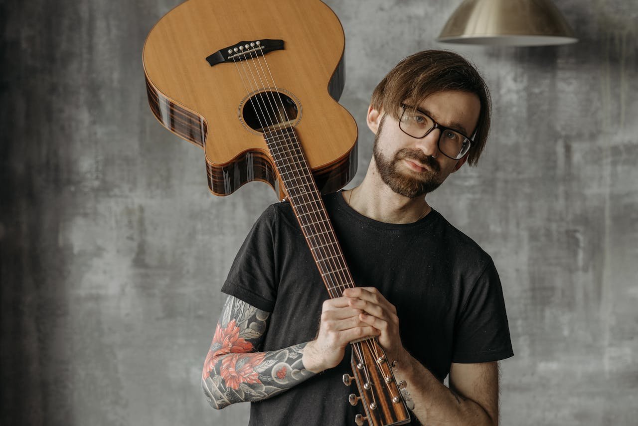 ndie musician with guitar adapting to new digital search rules in 2025