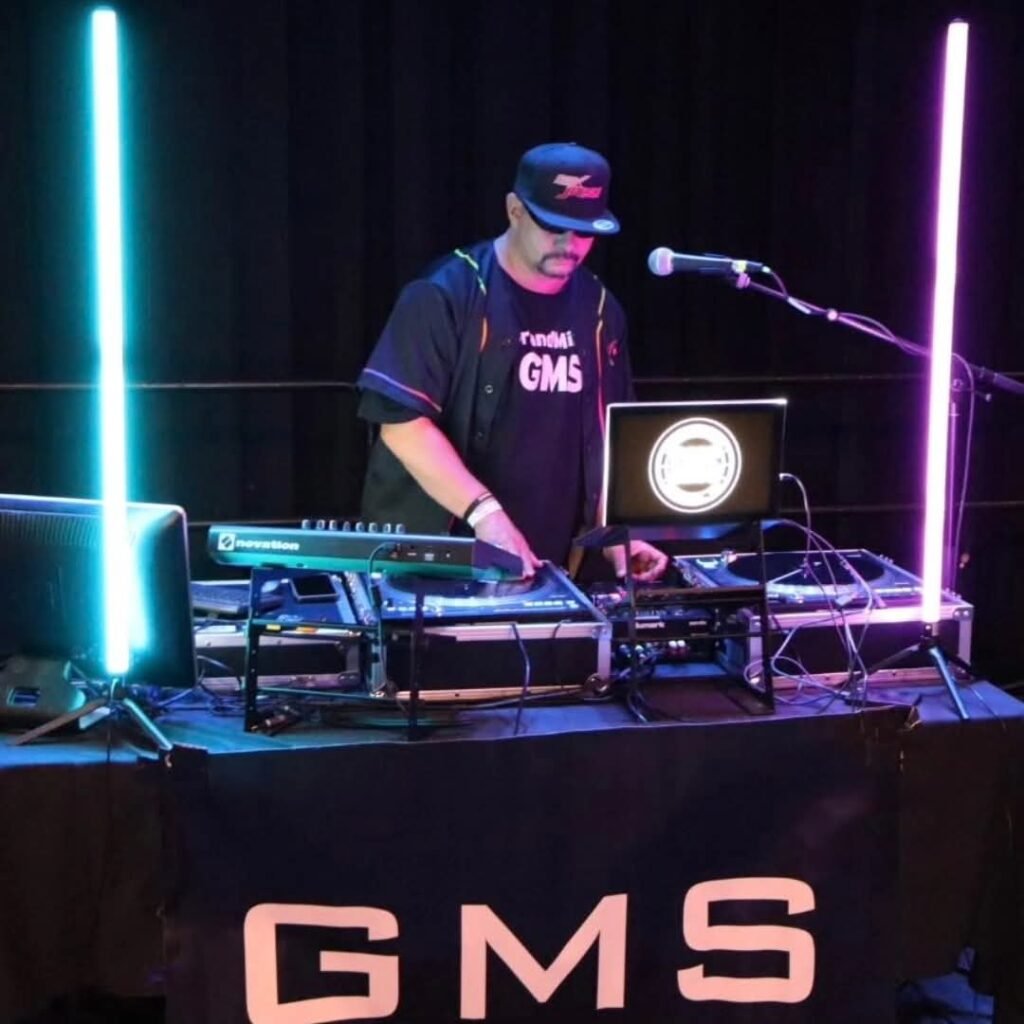GrandMixer GMS performing live at The Knitting Factory using turntables and LED stage lighting.
