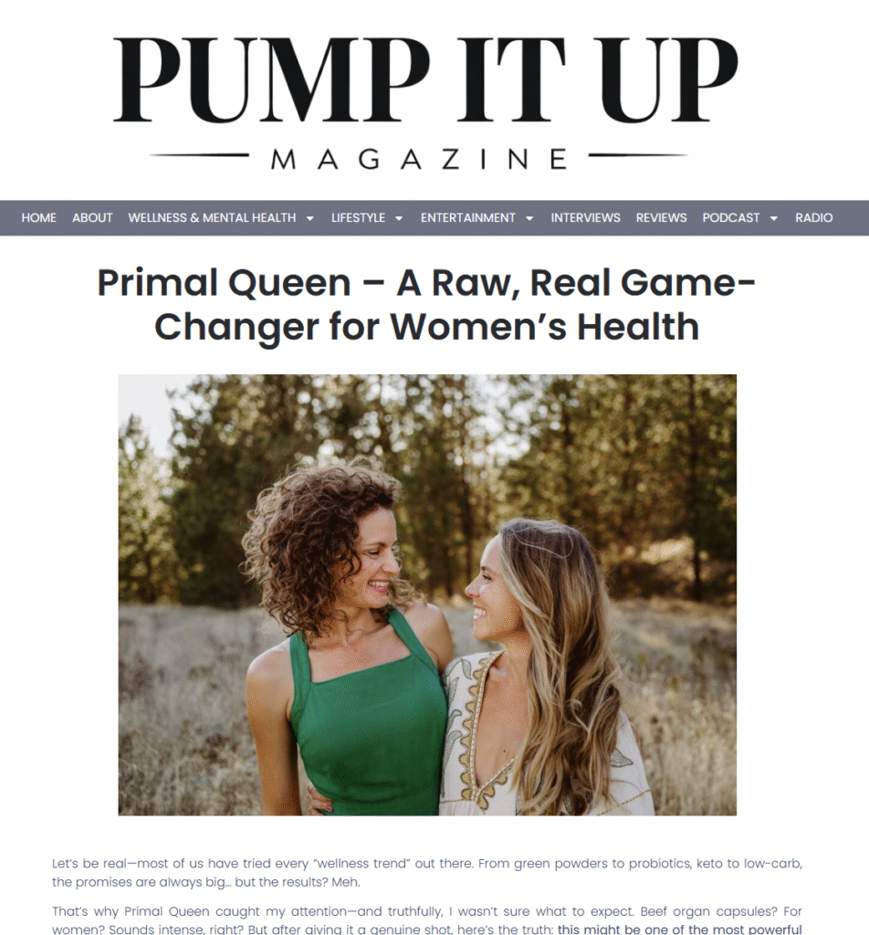 Two women smiling and embracing outdoors, representing connection, wellness, and women’s health.