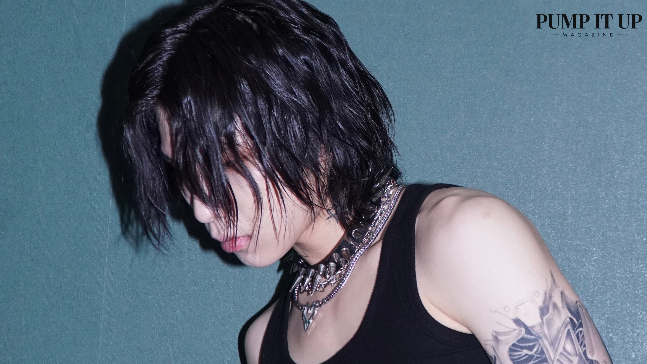 Artist with long hair and tattoos