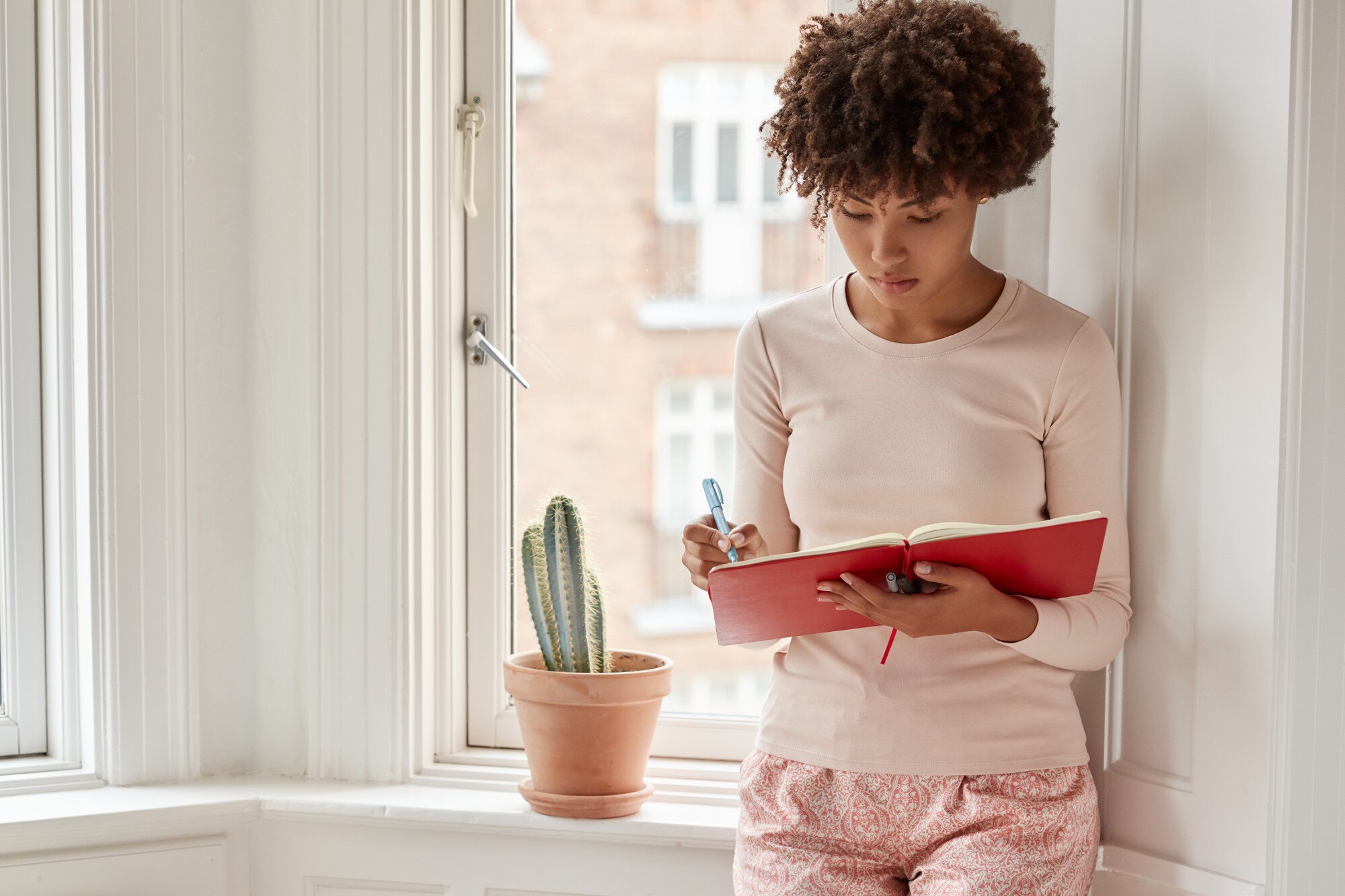 woman practicing mindfulness to lower stress, build confidence and stay emotionally balanced