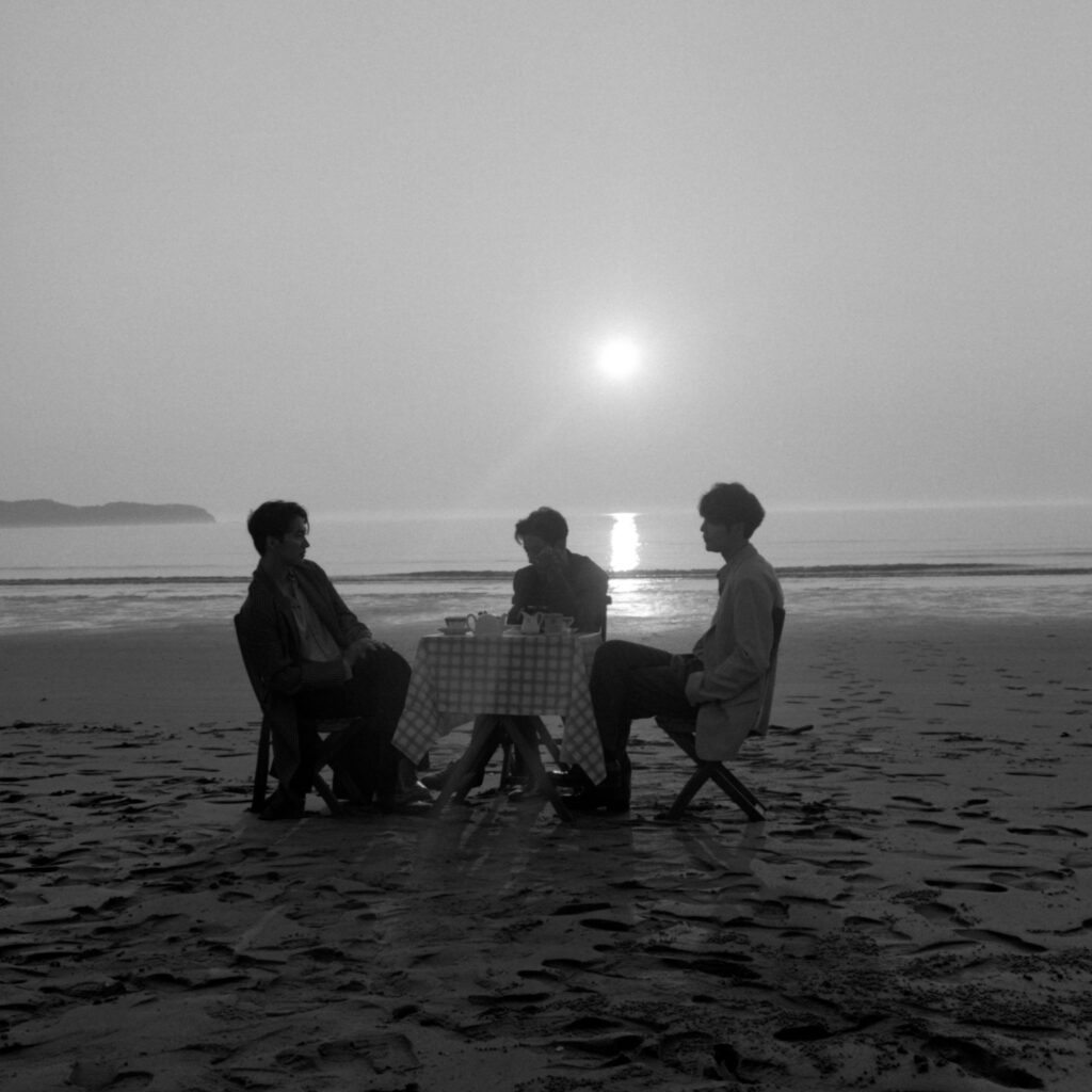 Official album cover for Funky Galaxy’s “Funky TONIGHT,” featuring the trio seated together on a beach at sunset.