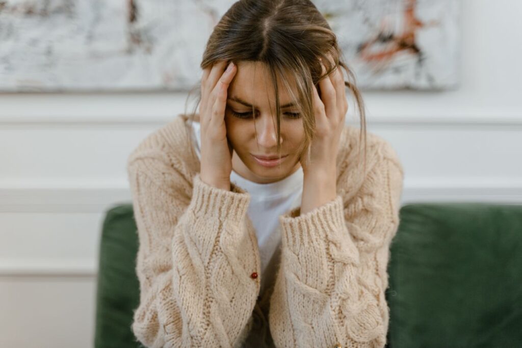 sad-woman-sitting-on-a-sofa-need self-care