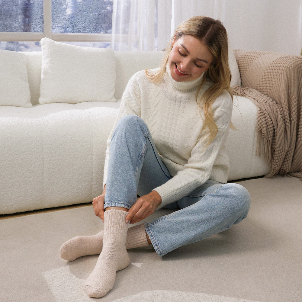 CLOSEMATE winter socks review featuring cozy knit socks, gift box and woman wearing cream winter socks